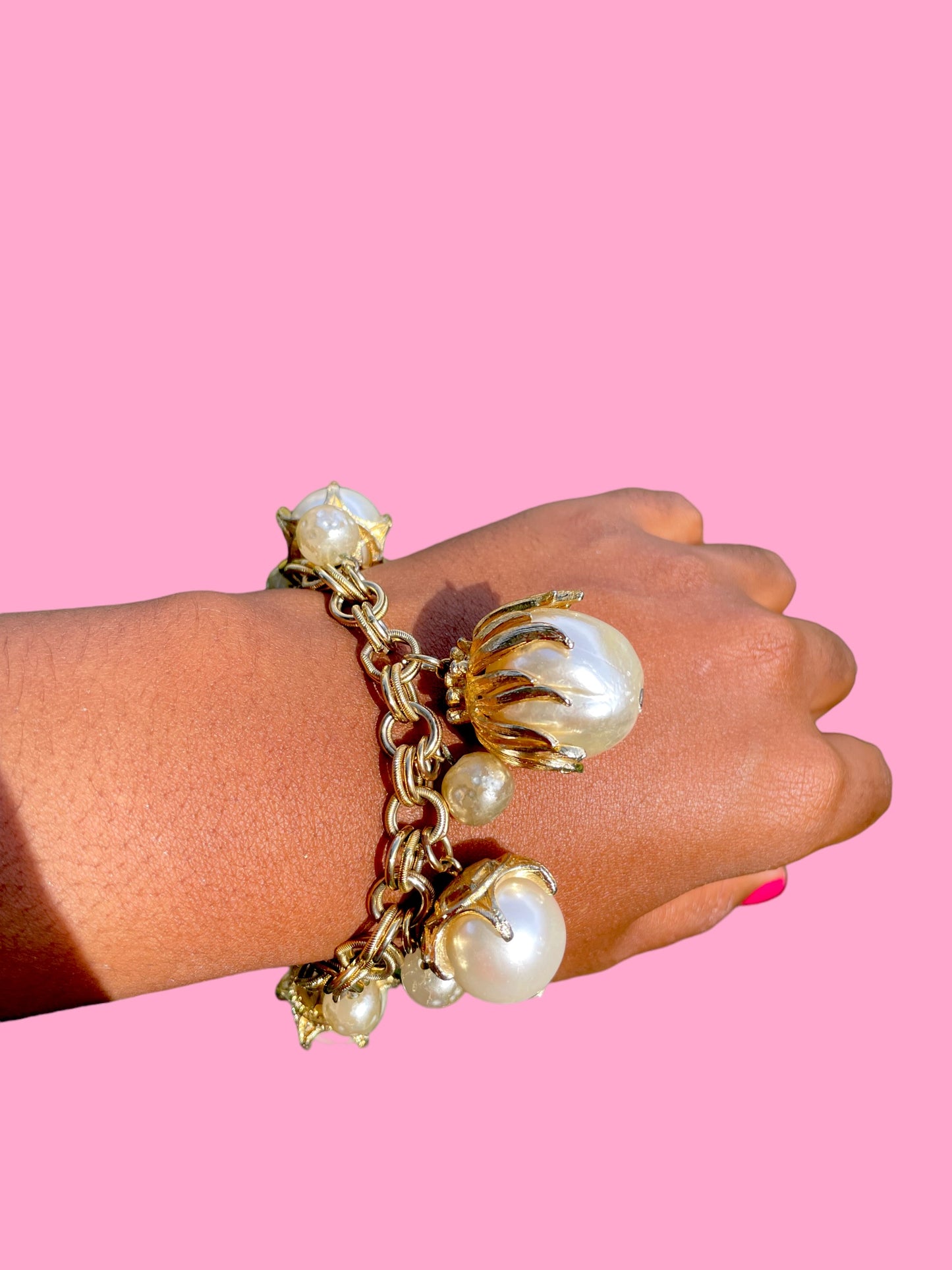Vintage gold and pearl charm bracelet