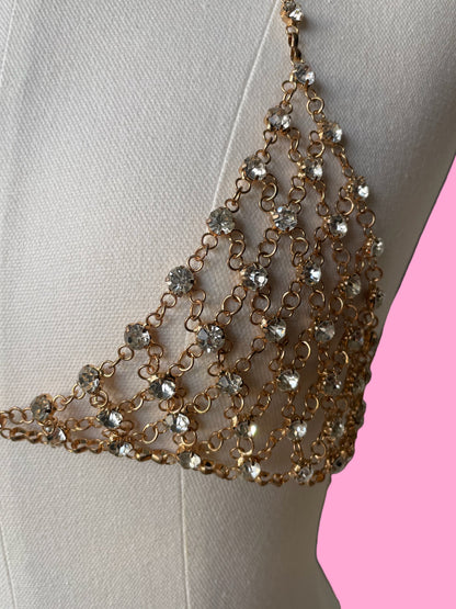 close up of gold chain rhinestone bralette