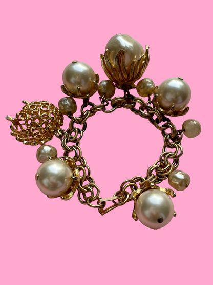 Vintage gold and pearl charm bracelet 